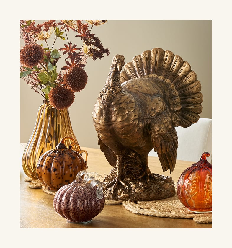 Autumn Estate fall decor with a bronze turkey and glass pumpkins