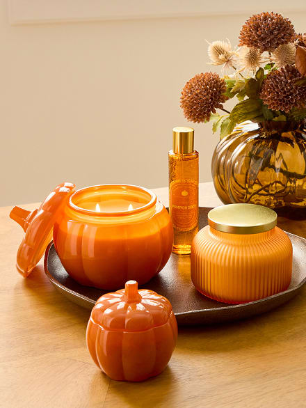 Pumpkin-shaped candles and fall fragrance