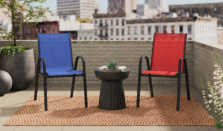 Blue and red sling chairs on an outdoor patio