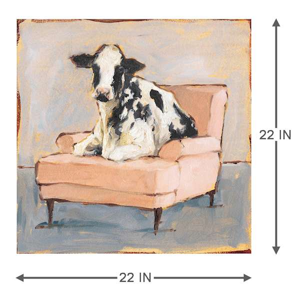 Cow Sitting Orange Chair Canvas Wall Art, 22"
