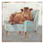Cow Sitting on Blue Chair Canvas Wall Art, 22"