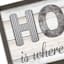 Glass Framed Home Is Where the Heart Is Wall Sign, 26x14