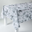 60X104In Blooming Floral Black/White Tablecloth