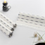 Set of 4 Ivory Reversible Rib Placemats with Navy Blue Stripes, 13x17