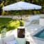 Highland Umbrella Patio Table, Brown Wicker