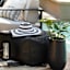 Crosby St. Black Hermosa Outdoor Pouf, 20"