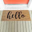 Black & Natural Hello Script Coir Mat, 22x47