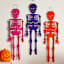 Purple Metal Flocked Skeleton Wall Décor, 25"