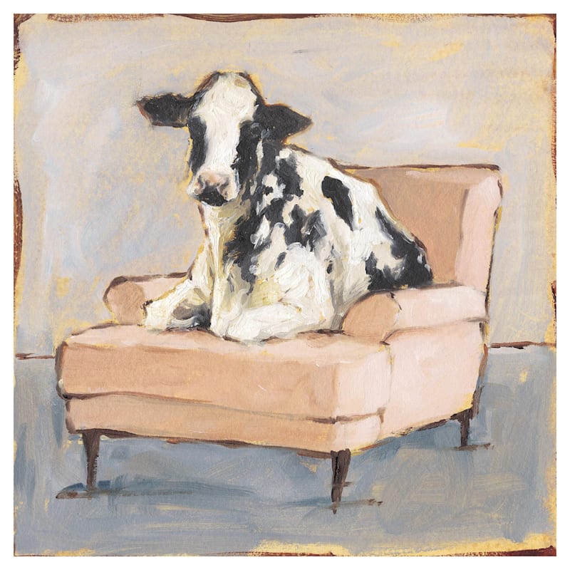 22X22 Cow Sitting Orange Chair Canvas Wall Art