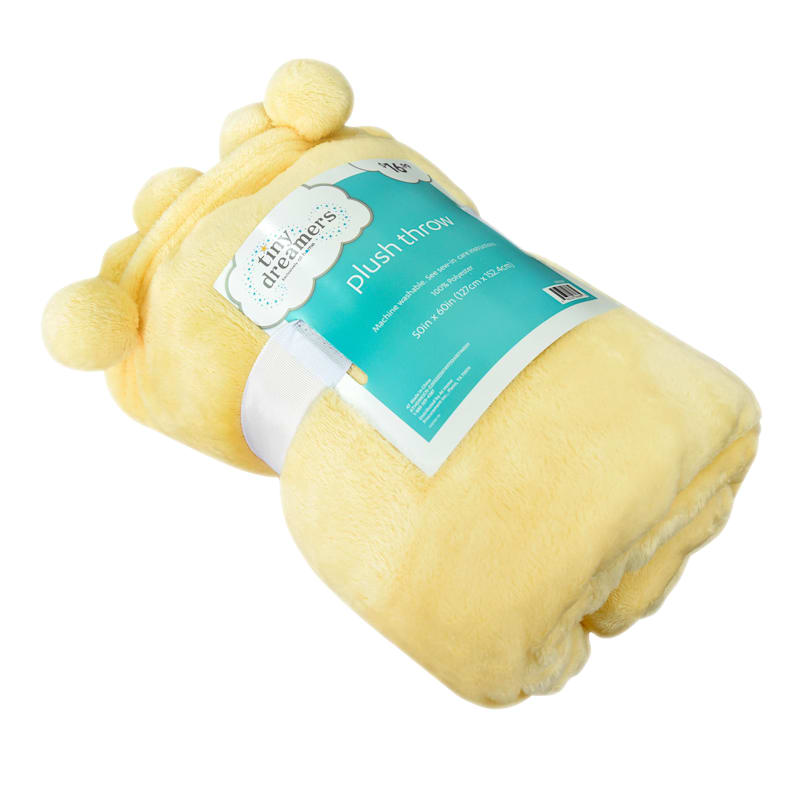 Yellow pom top pom throw