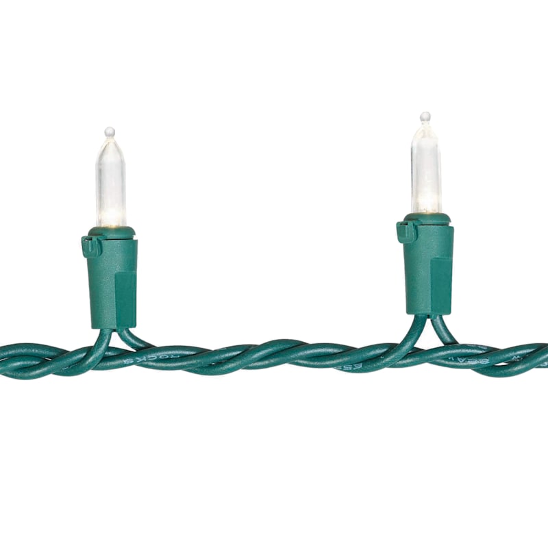 White mini lights with green cord outlet